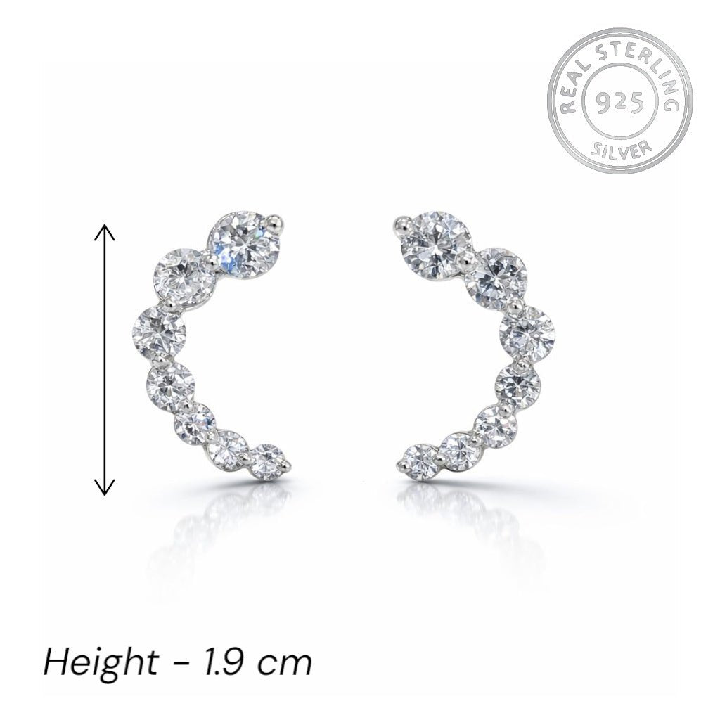 925 sterling silver earrings with clear stones on a white background, featuring 'Real Sterling 925' stamp.