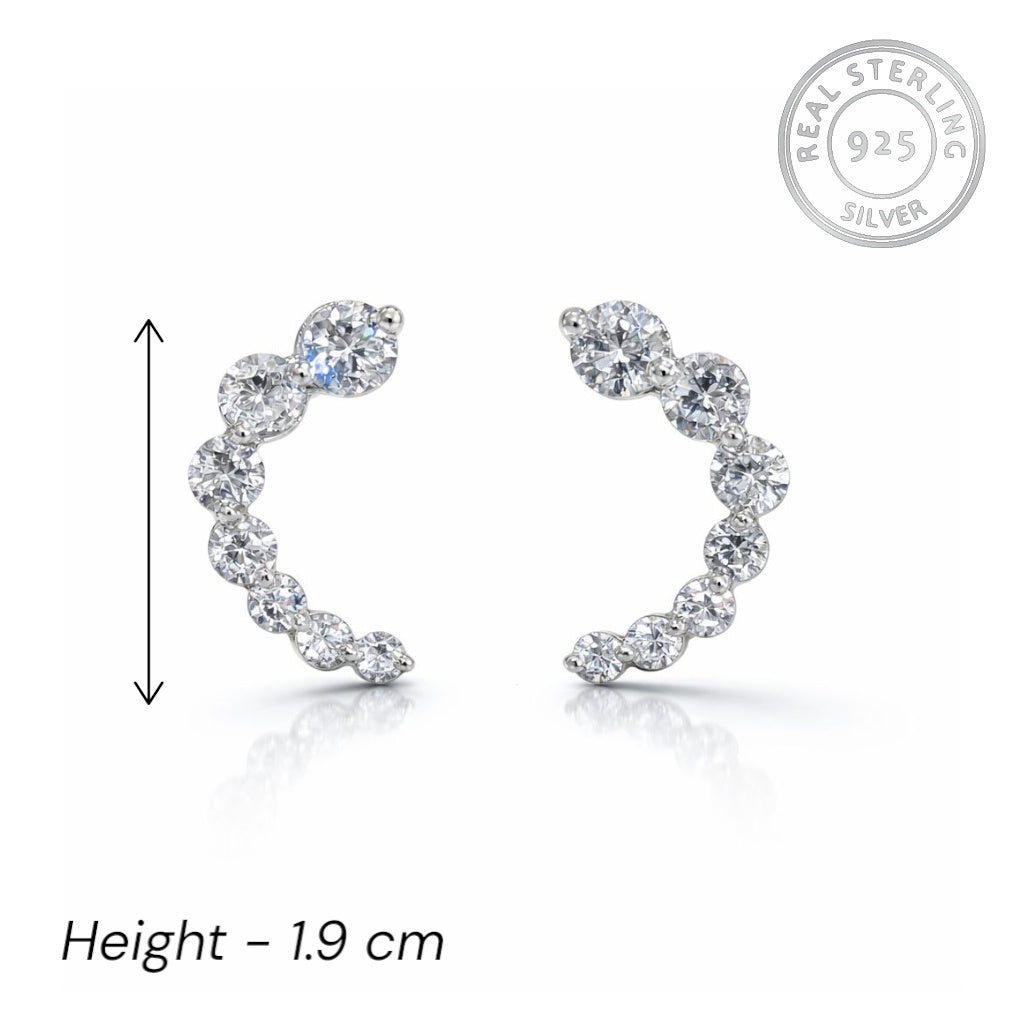 925 sterling silver earrings with clear stones on a white background, featuring 'Real Sterling 925' stamp.