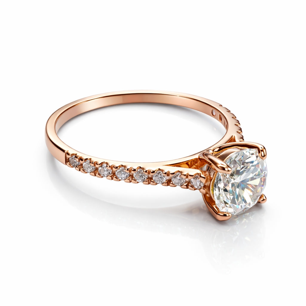 Rose gold ring with a large cz and smaller cz stones on the band against a white background