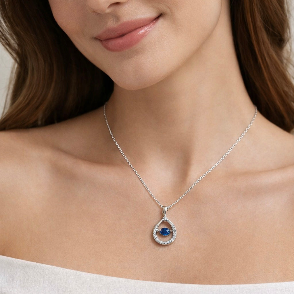 925 sterling silver blue dancing stone teardrop pendant necklace worn by model