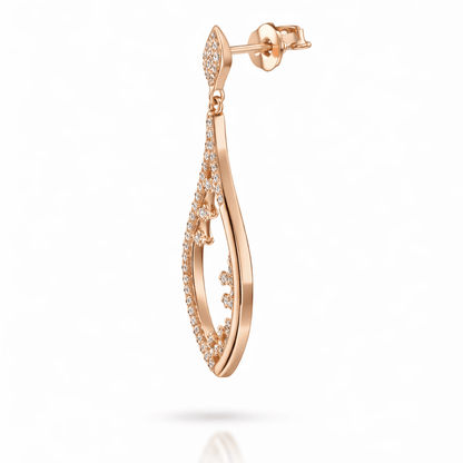 Side view of sterling silver rose gold plated drop earrings with cz stones