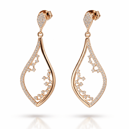Sterling silver Rose gold earrings with CZ accents on a white background