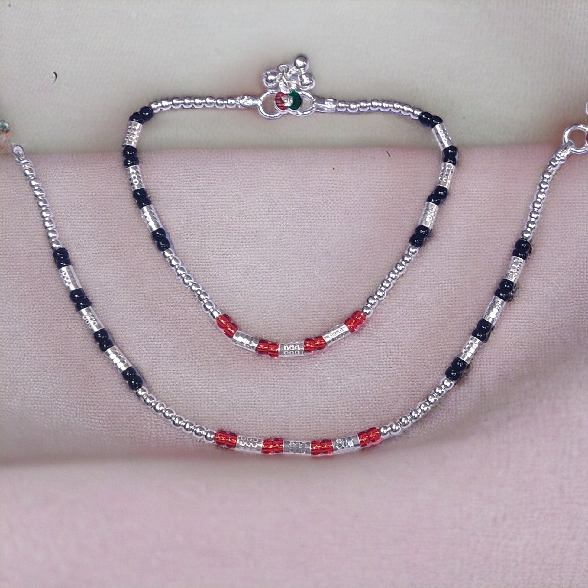 Silver payal with black and red beads