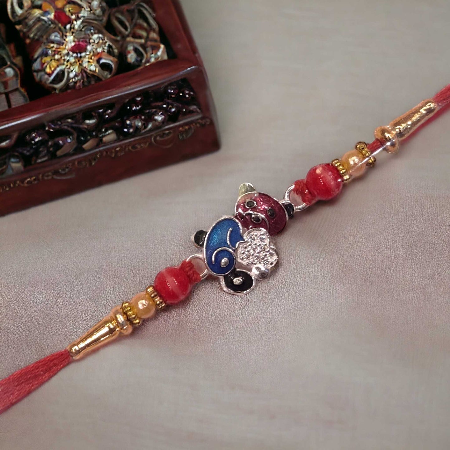 Silver rakhi for raksha bandhan - jauhari Jewellers