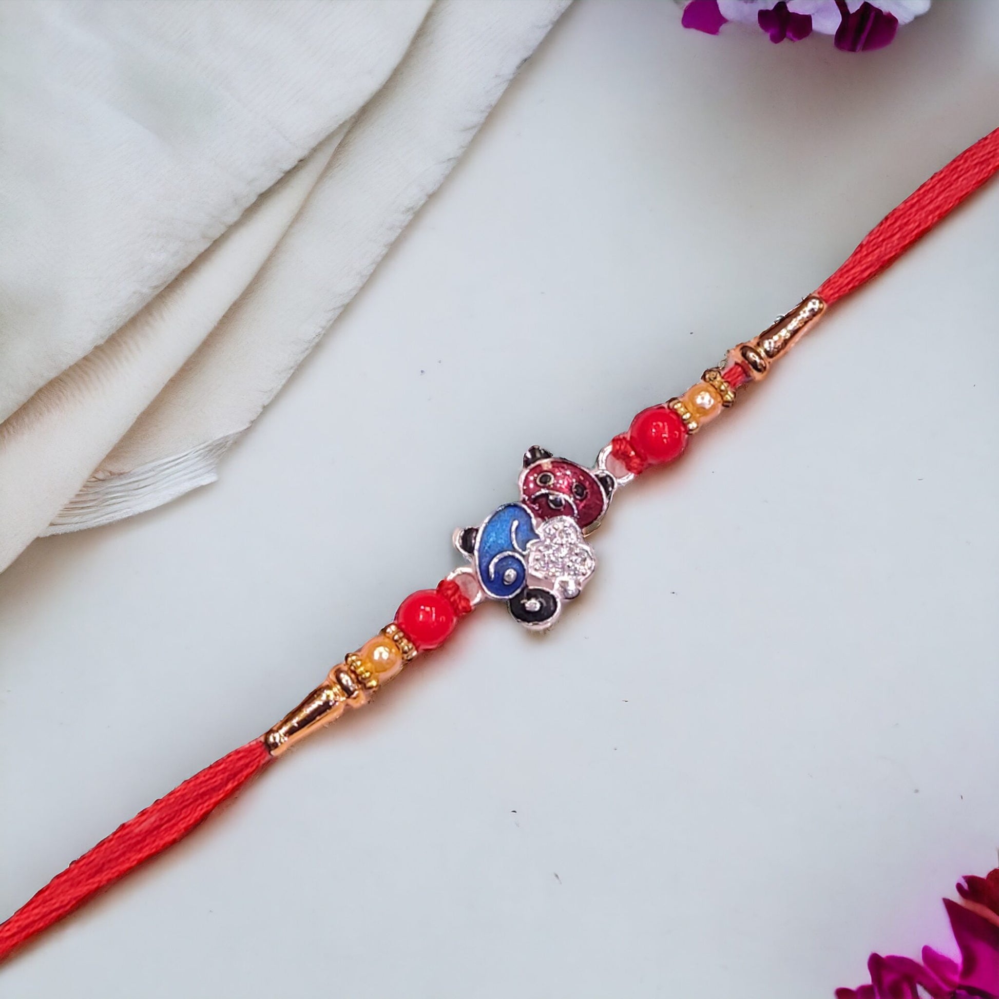 Silver rakhi for kids - jauhari Jewellers