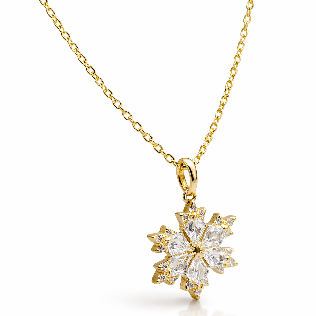 Sterling silver Golden necklace with a snowflake-shaped cz pendant on a white background