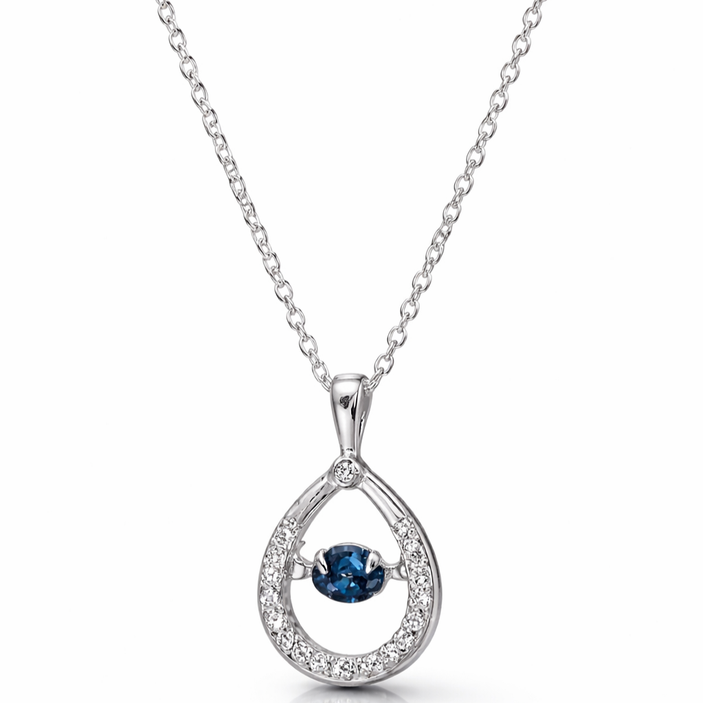 Close-up of blue dancing stone teardrop pendant necklace in 925 sterling silver
