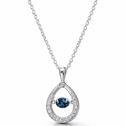 Close-up of blue dancing stone teardrop pendant necklace in 925 sterling silver