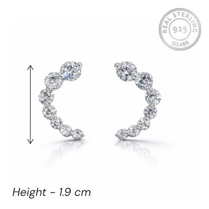 925 sterling silver earrings with clear stones on a white background, featuring 'Real Sterling 925' stamp.