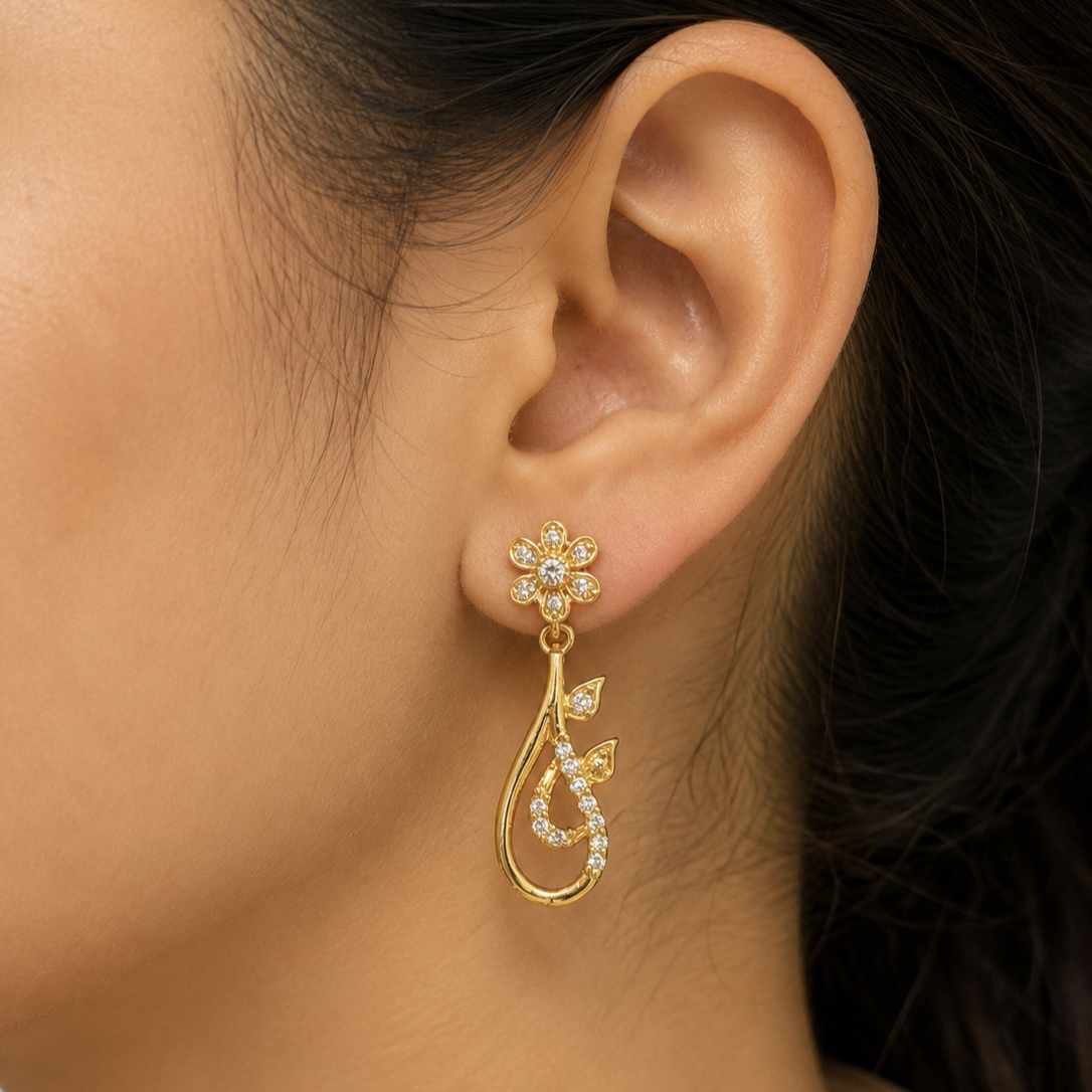Women wearing sterling silver floral drop earrings by jauhari jewellers