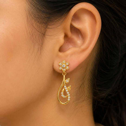 Women wearing sterling silver floral drop earrings by jauhari jewellers