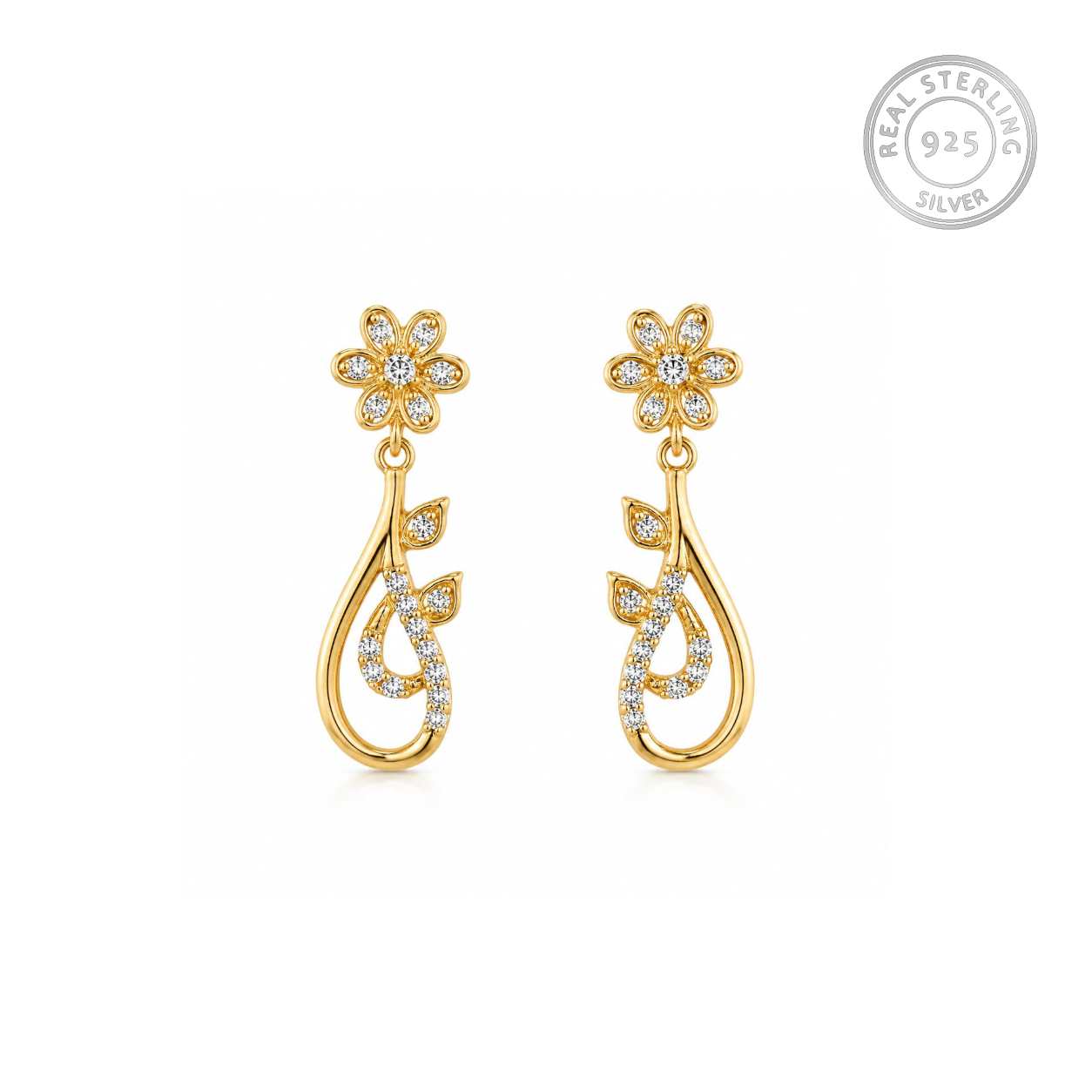 A pair of sterling silver golden dangle earrings with flower-shaped tops set with small clear stones and teardrop-shaped drops with leaf motifs, shown on a white background with a 'REAL STERLING 925' badge in the top right.
