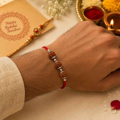 Silver rakhi with thread