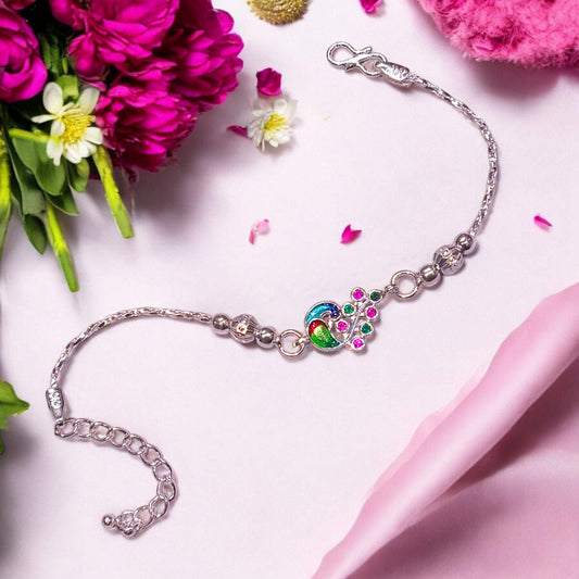Silver peacock Rakhi - jauhari jewellers