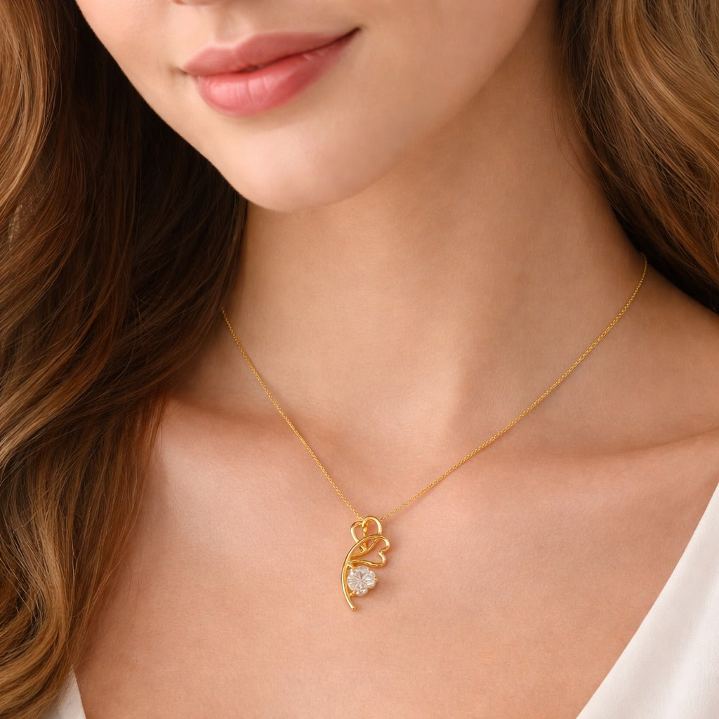 Sterling silver Gold necklace with a cz pendant worn by a model