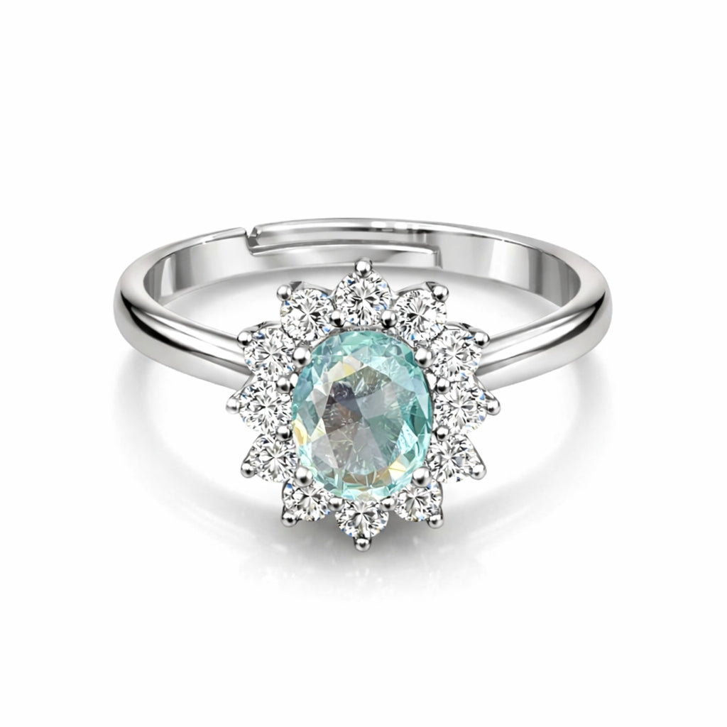 925 sterling Silver ring with a blue gemstone and cz accents on a white background