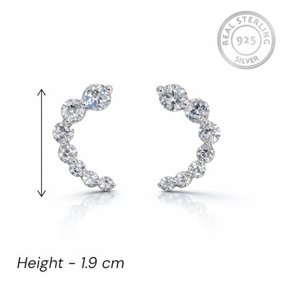 925 sterling silver earrings with clear stones on a white background, featuring 'Real Sterling 925' stamp.