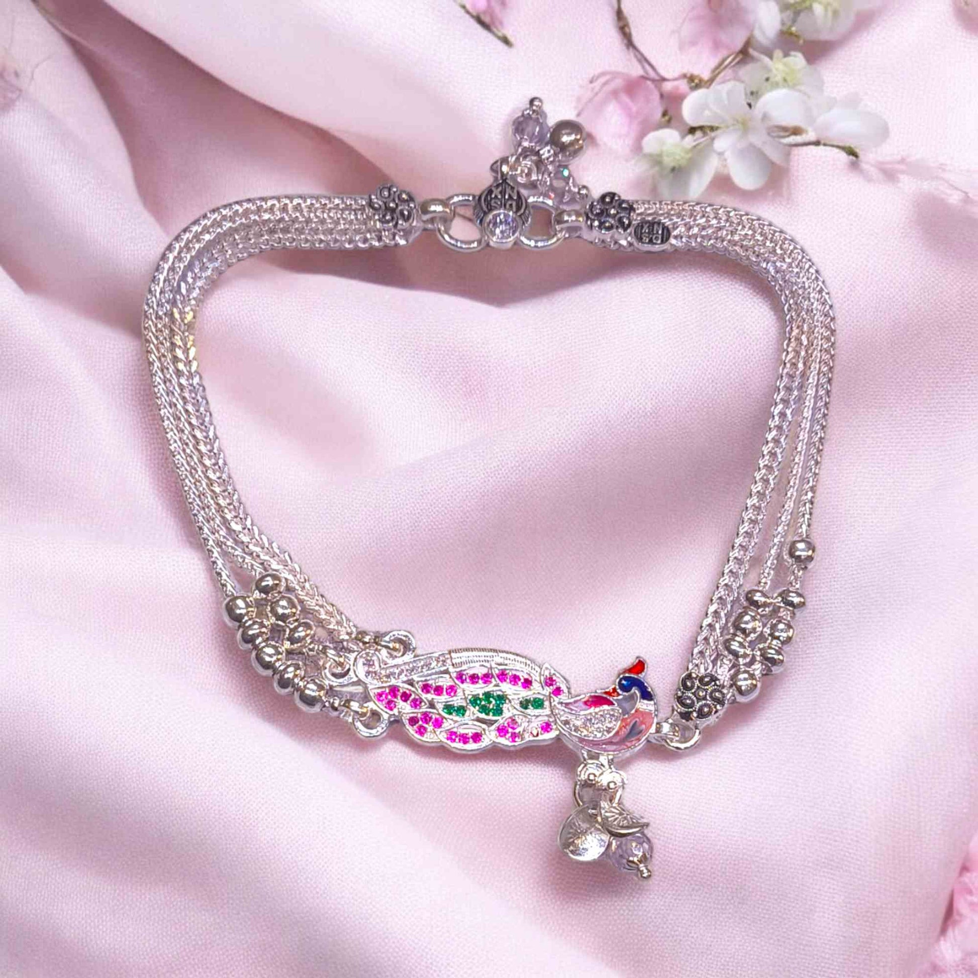 Silver peacock anklets